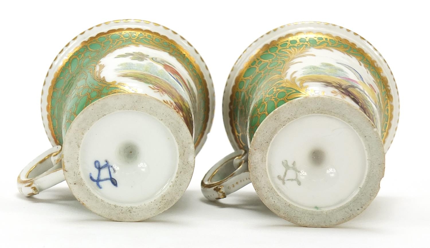 Pair of 19th century porcelain Sevres style custard cups hand painted and gilded with birds of - Image 3 of 3