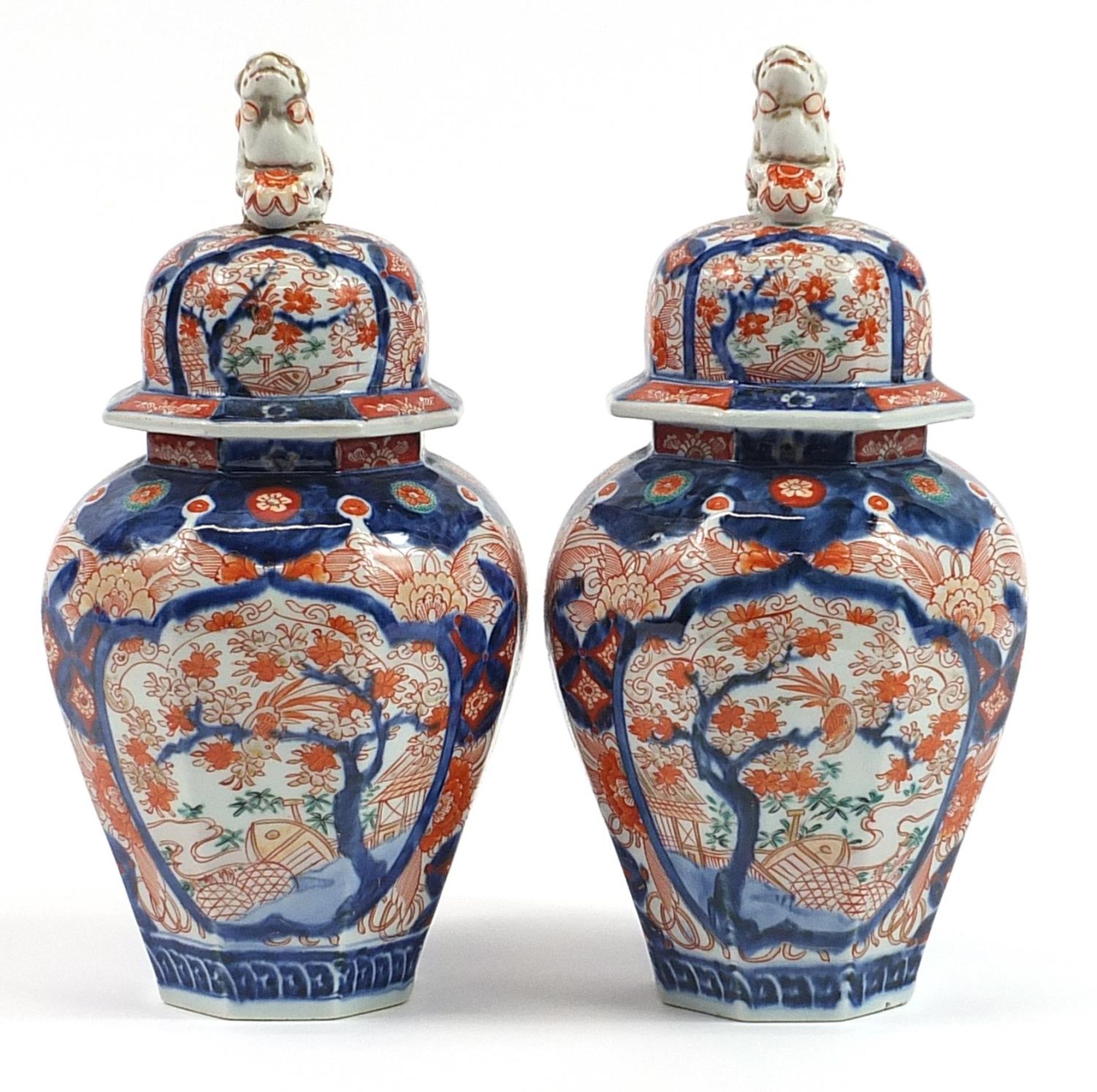 Pair of Japanese Imari porcelain vases and covers hand painted with flower, 32cm high