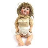 German bisque headed doll with jointed limbs, numbered 169 to the back of the head, 48cm in length