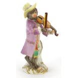 Meissen, German porcelain figure of a monkey musician playing a violin, numbered 60006 to the