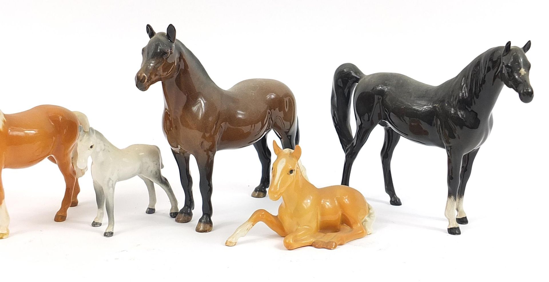 Seven Beswick horses including dapple grey and tan, the largest 20.5cm in length - Image 3 of 4