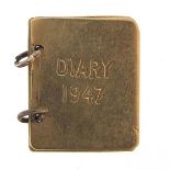 9ct gold opening 1947 diary charm, 1.5cm high, 1.5g