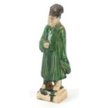 Chinese stoneware figure with green glaze, 24cm high