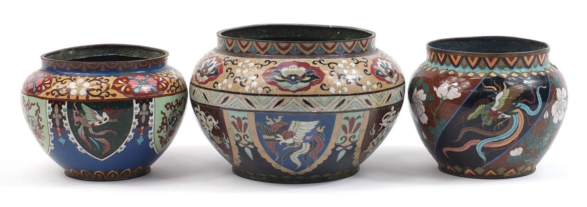 Three Japanese cloisonne jardinieres enamelled with dragons and flowers, the largest 24cm in