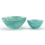 Kosta Boda, two Scandinavian green smoky glass bowls, the largest 17cm in diameter