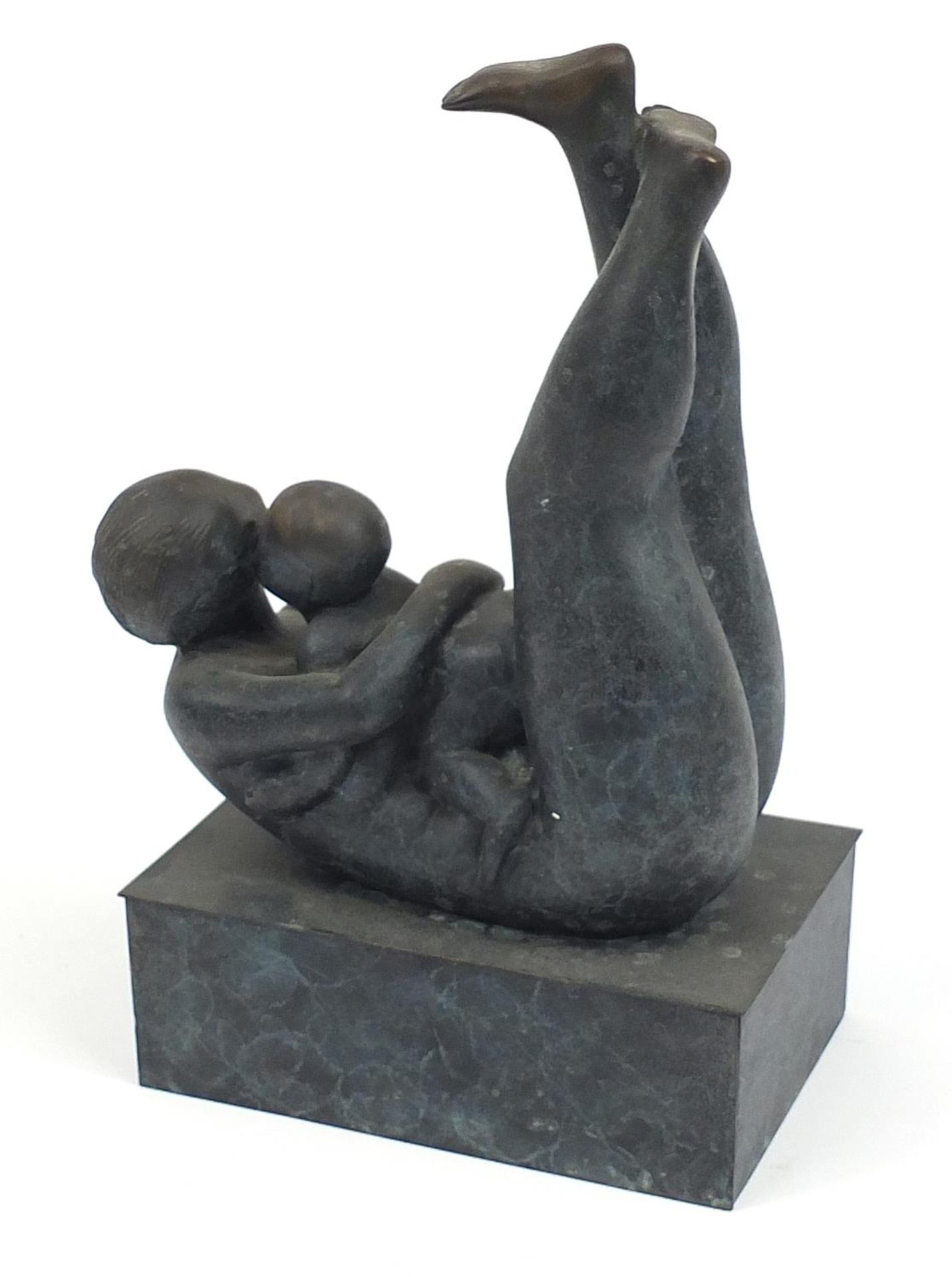 Mid century style patinated bronze study of a mother and child raised on a rectangular block base, - Image 2 of 3