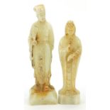 Two Chinese carved stone figures, the largest 23.5cm high