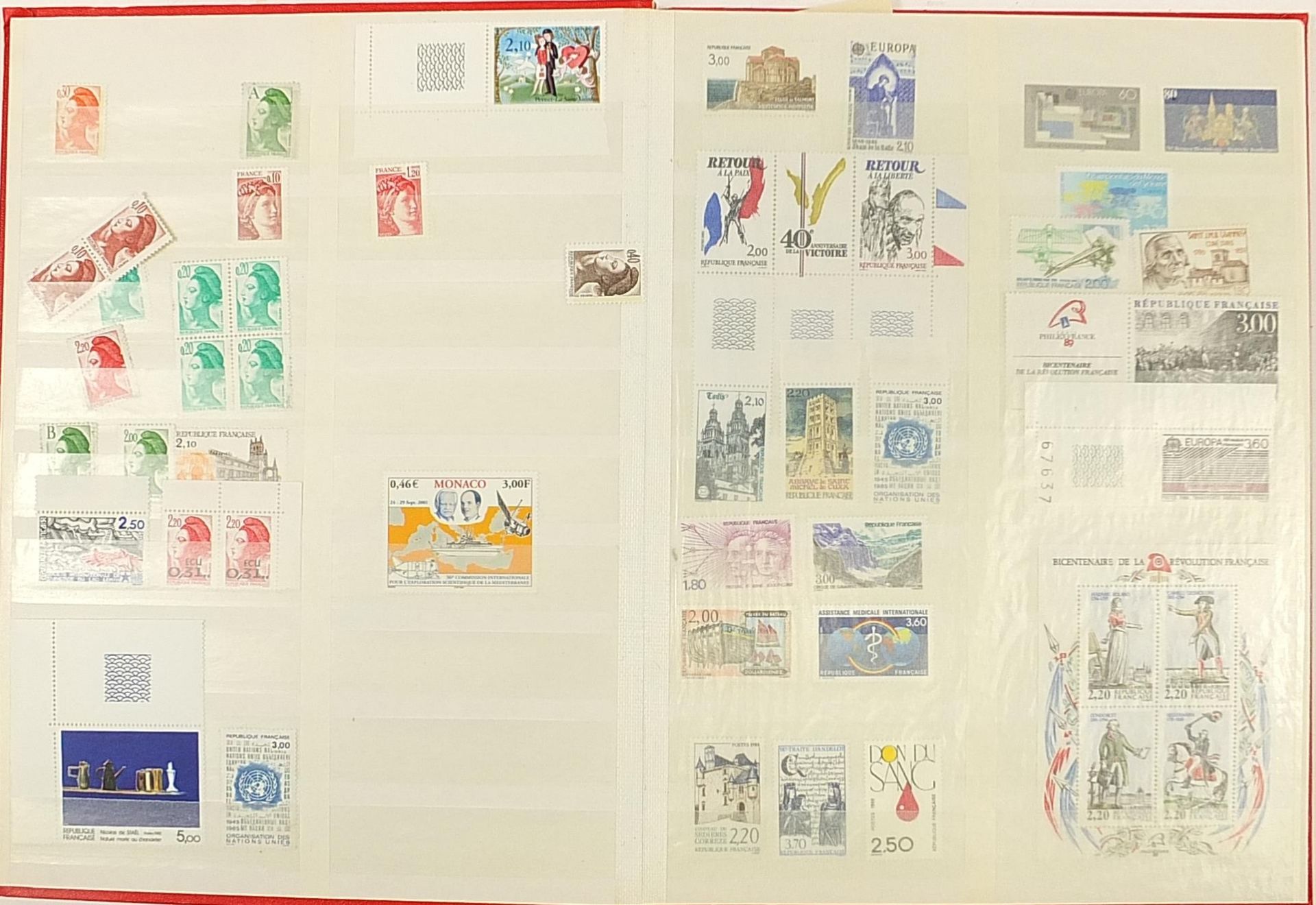 Collection of Commonwealth stamps arranged in an album including Monaco and France