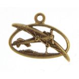 14ct gold bi plane charm, 1.3cm in length, 0.6g