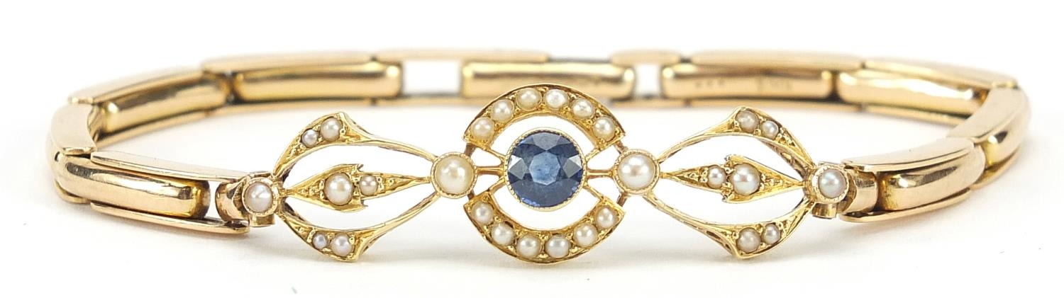 15ct gold sapphire and seed pearl bracelet housed in Wittakers Oldham fitted box, 16cm in length,