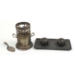 Decorative arts metalware including an Art Nouveau silver plated bottle stand and Arts & Crafts