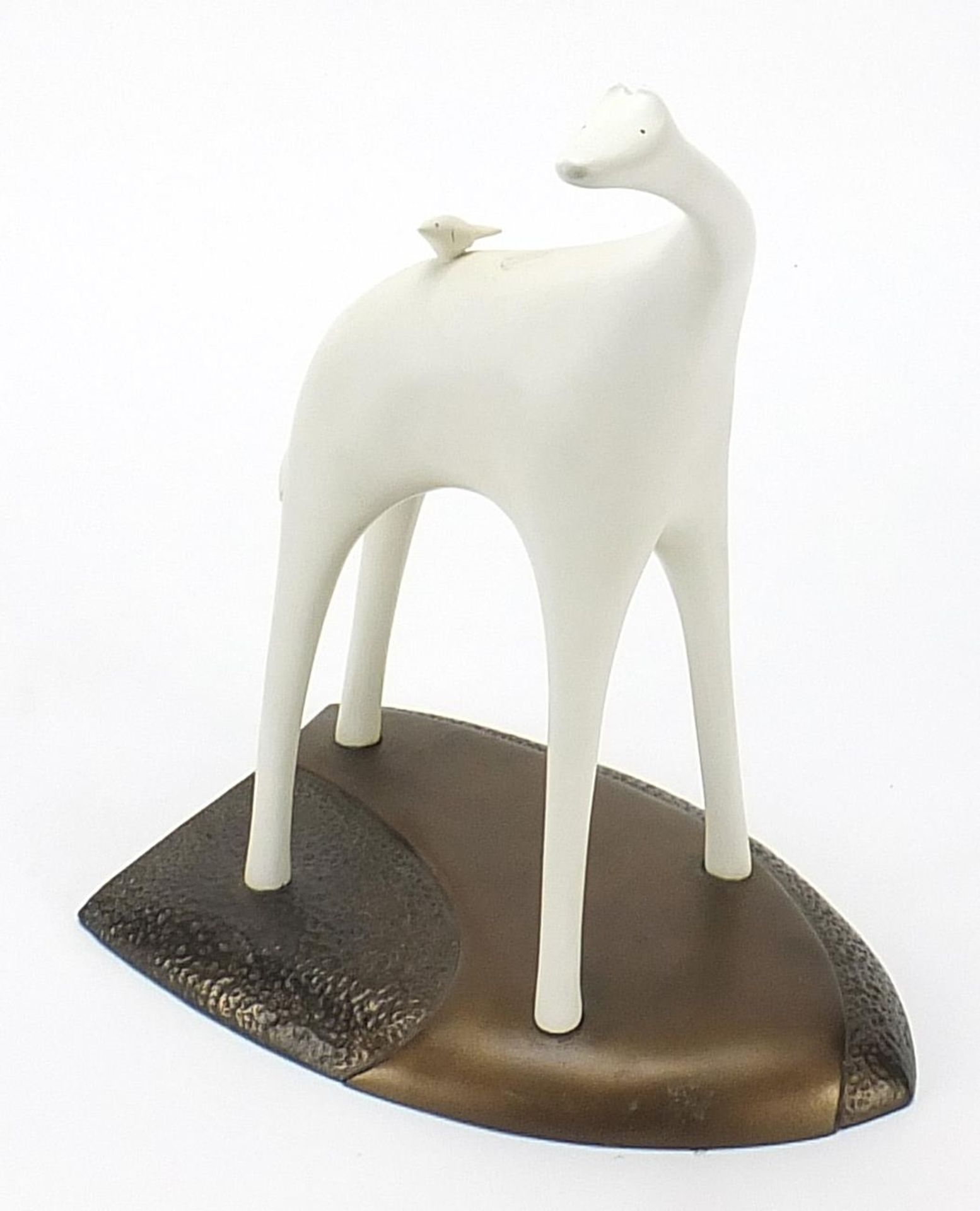 Modernist sculpture of a stylised giraffe and bird raised on a shaped bronzed base, limited