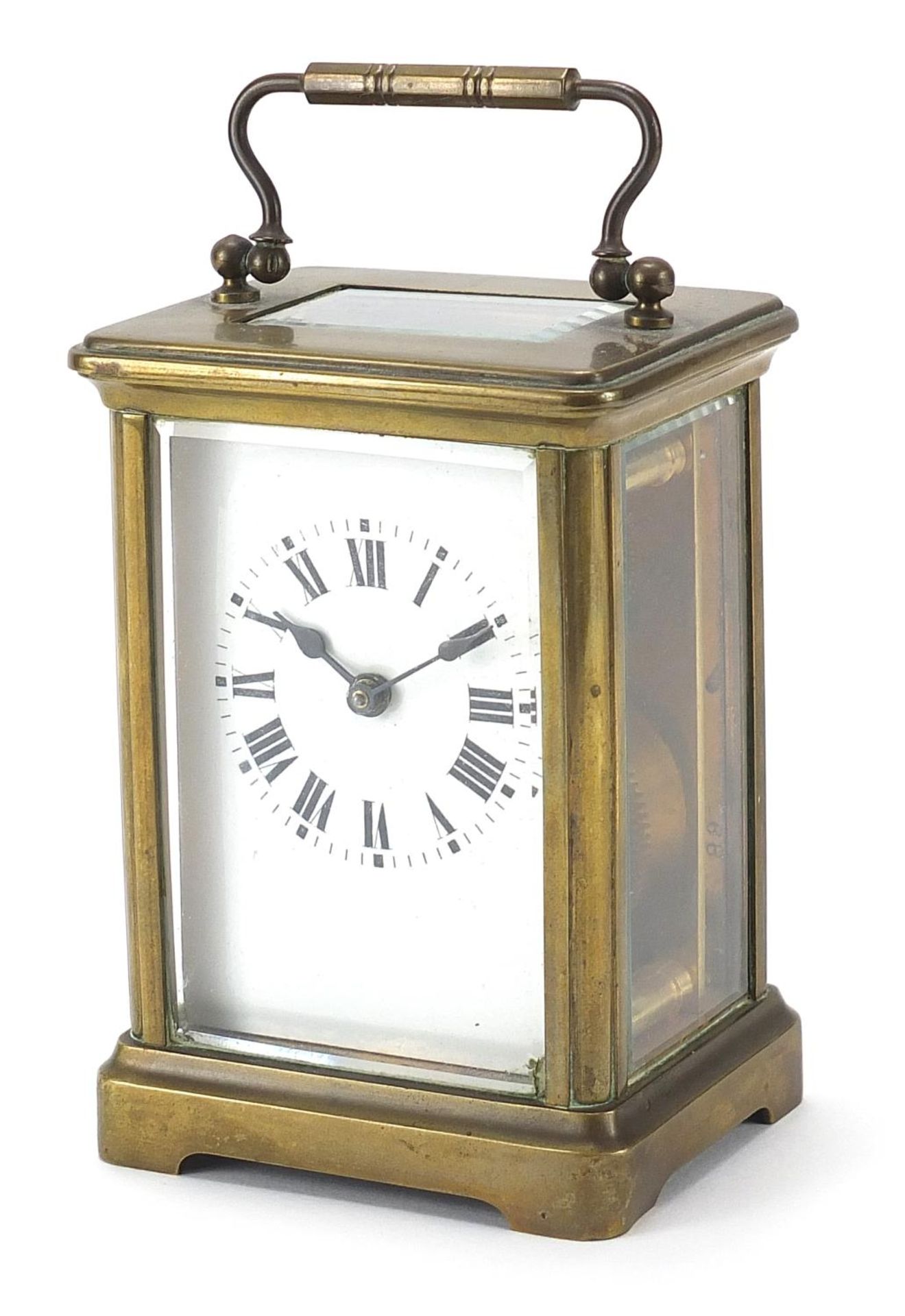 Brass cased carriage clock with swing handle, 11.5cm high