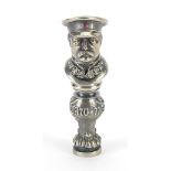 Silver desk seal in the form of a Russian officer in uniform, set with clear and ruby stones,