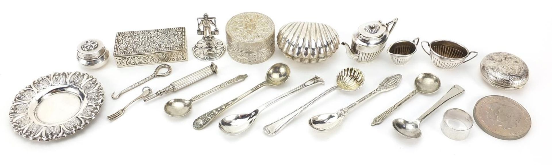 Silver plated and white metal objects including doll's house tea service, pill boxes and mustard