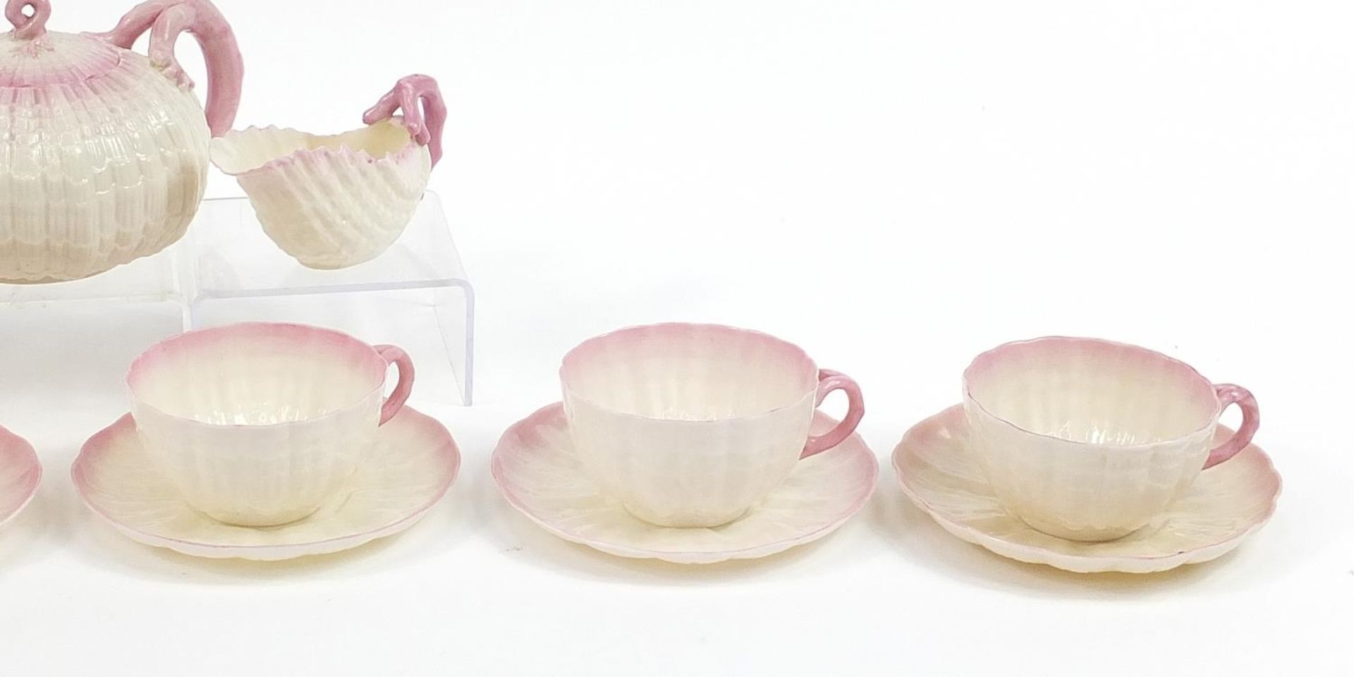 Belleek, Irish porcelain shell design six place tea service comprising teapot, six cups with - Image 3 of 4