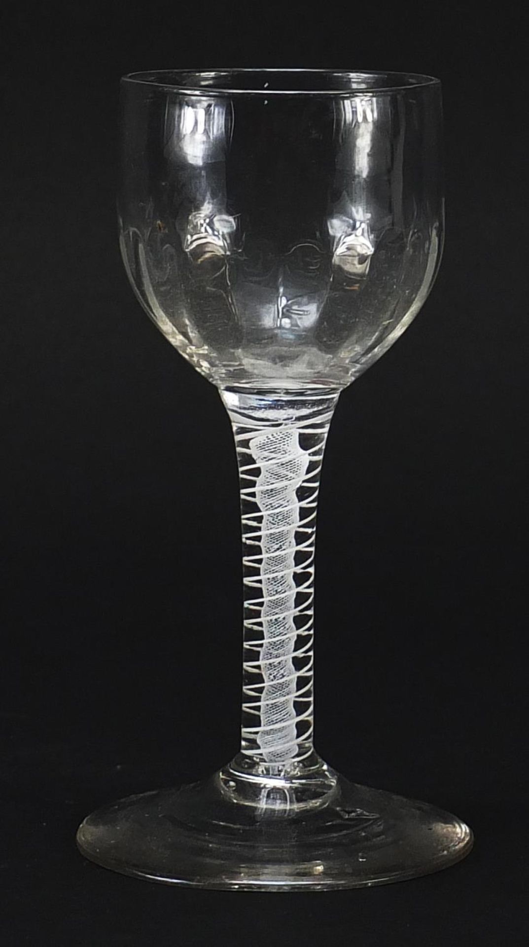18th century wine glass with opaque twist stem and facetted bowl, 15cm high