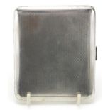 A E Poston & Co Ltd, George V silver engine turned cigarette case with gilt interior, 10cm wide,