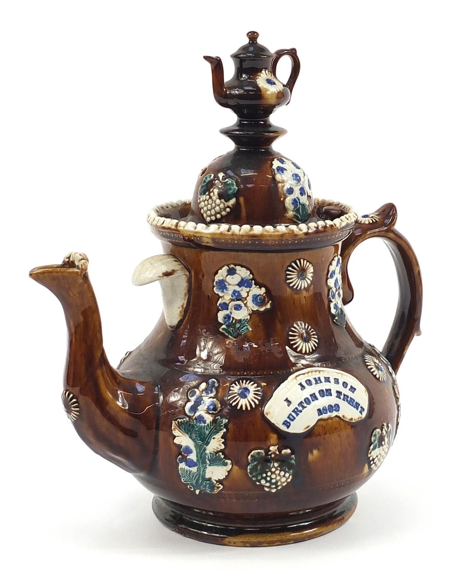 Large Measham treacle glazed Bargeware teapot inscribed J Johnson Burton on Trent 1892, 33cm high
