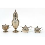 Three silver mustards and a large silver baluster shaped caster by Mappin & Webb, the largest 17cm