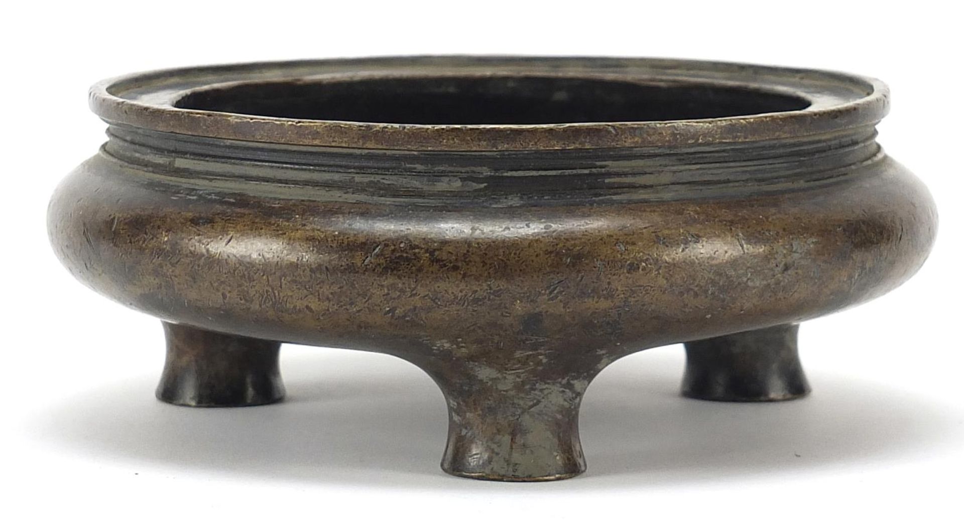 Chinese patinated bronze tripod censer, character marks to the base, 16cm in diameter - Image 2 of 4