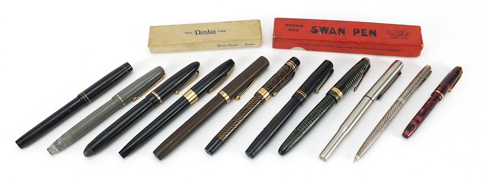 Ten vintage fountain pens, two with boxes and a silver Shaeffer ballpoint pen, including Swan,