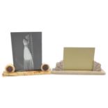 Two Art Deco marble and onyx photo frames, the largest 40cm wide
