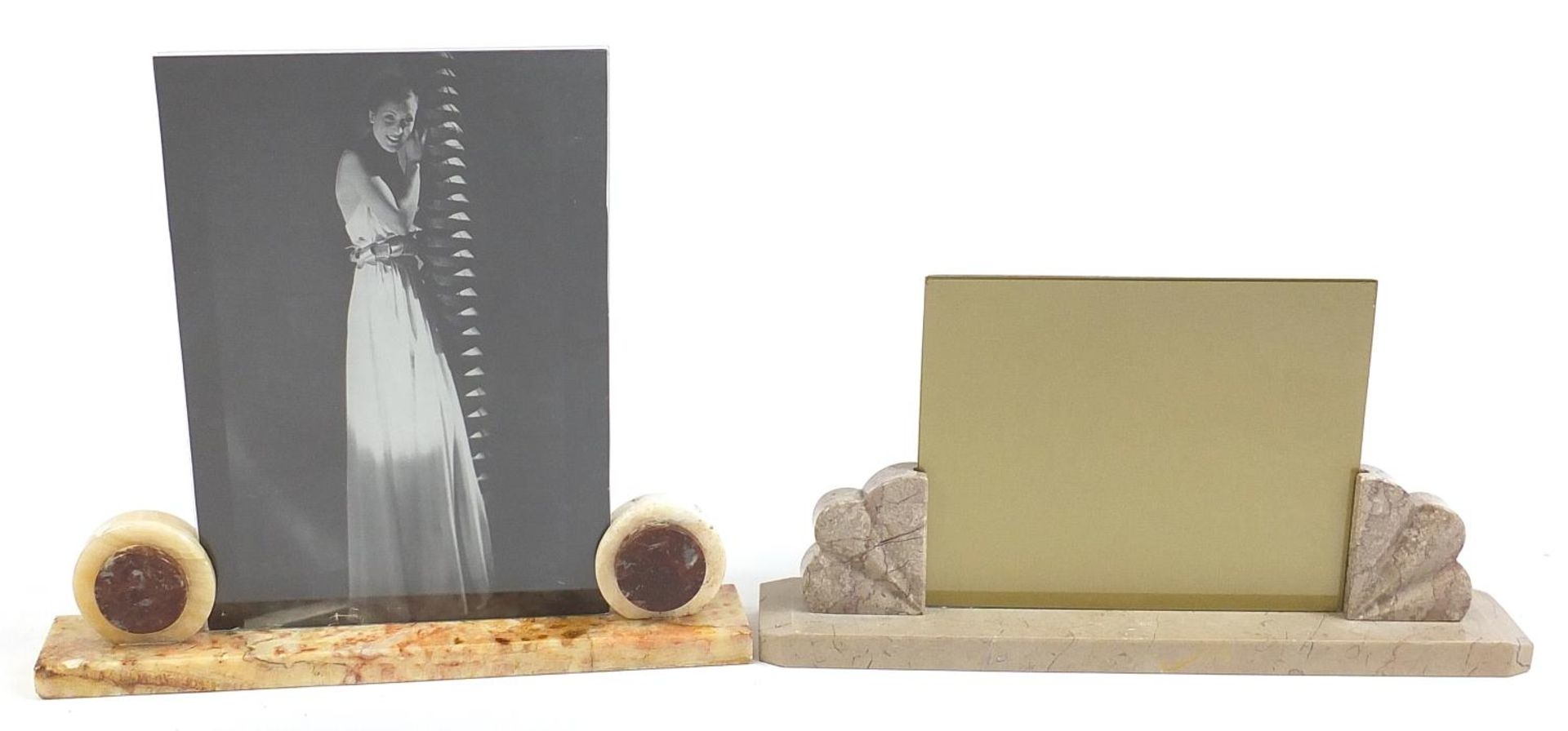 Two Art Deco marble and onyx photo frames, the largest 40cm wide