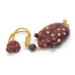 Japanese carved wood three section okimono in the form of a ladybird, 9cm in length