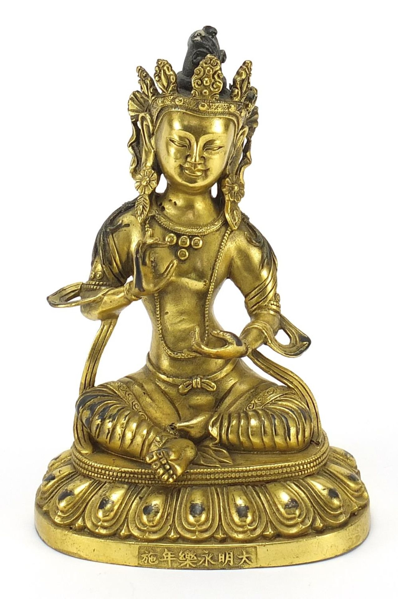 Chino Tibetan gilt bronze figure of seated Buddha, 20cm high