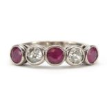 18ct white gold ruby and diamond five stone ring, size O, 5.0g