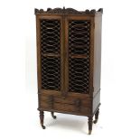 William IV mahogany display cabinet with brass lattice doors above two drawers, 128cm H x 61cm W x