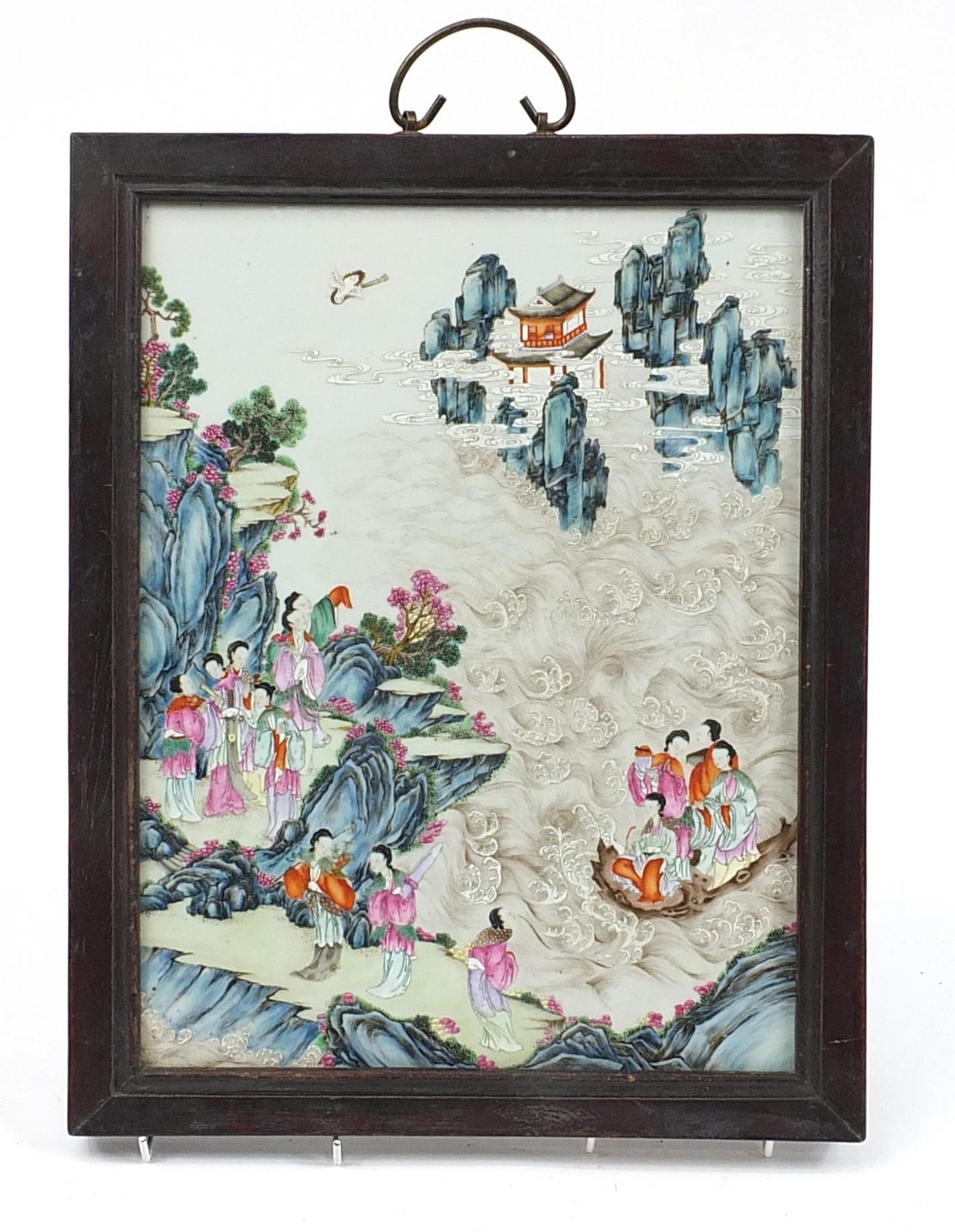 Chinese porcelain panel housed in a hardwood screen, hand painted in the famille rose palette with