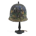 Good quality patinated bronze lily pad design table lamp with Tiffany design leaded shade, 43.5cm