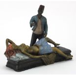 Cold painted bronze figure of an Arab and nude female in the style of Franz Xaver Bergmann, 18cm