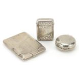 Two Victorian and later silver vestas and a silver plated sovereign case, the largest 6cm in length,
