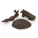 Three Japanese patinated bronzes comprising rat with a sack, dragonfly and shell, each with