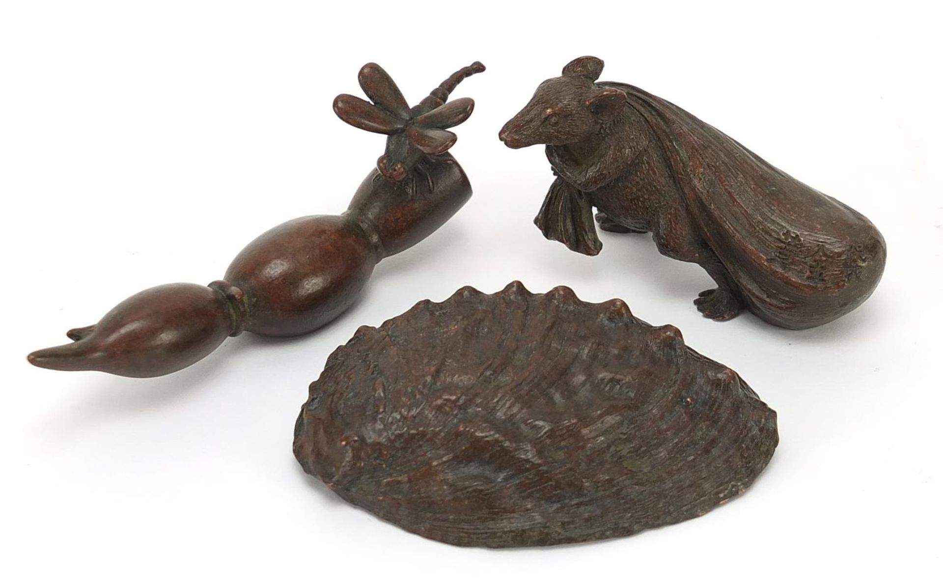 Three Japanese patinated bronzes comprising rat with a sack, dragonfly and shell, each with