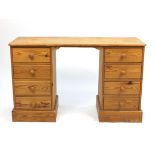 Pine dressing table with eight drawers, 77cm H x 126cm W x 46cm D