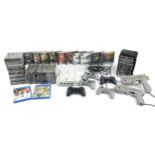 Collection of Play Station 1 games, controllers, guns and a Sega Dreamcast games console