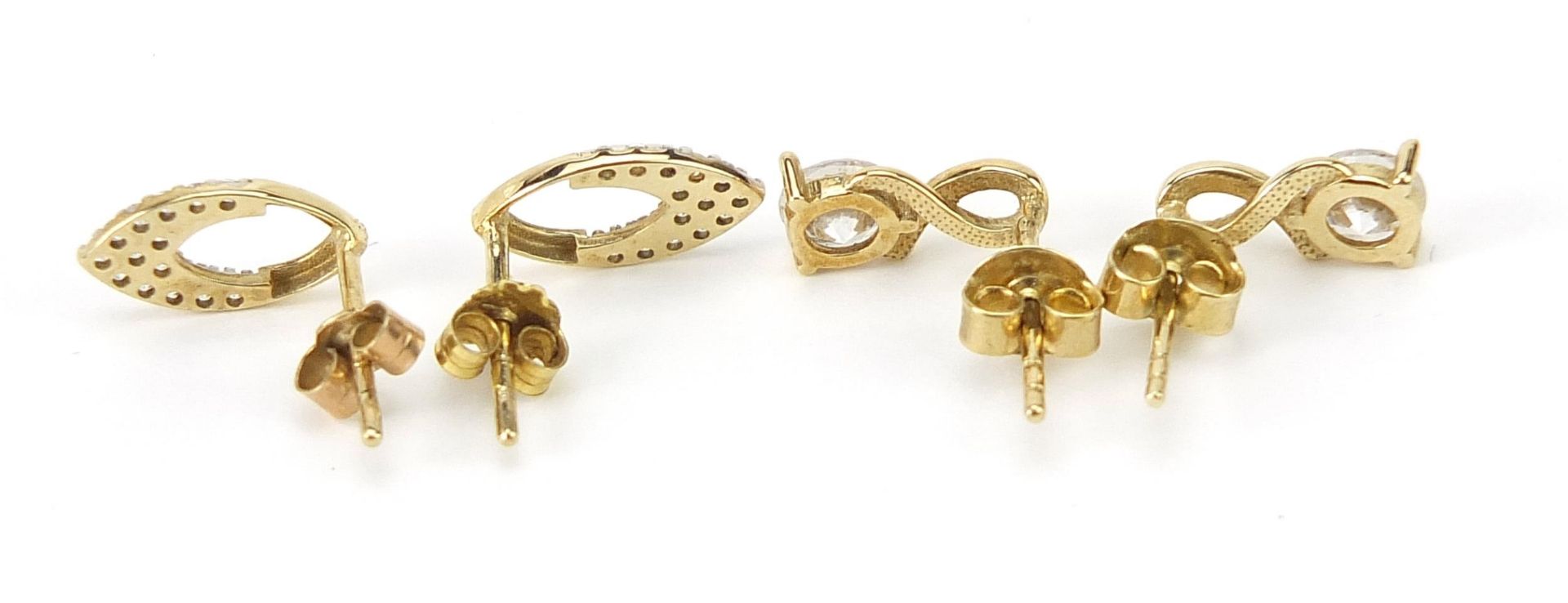 Two pairs of 9ct gold clear stone stud earrings, the largest 1.1cm high, total 2.1g - Image 3 of 3