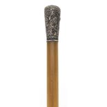 Chinese rhinoceros horn stick with unmarked silver pommel embossed with figures, 53cm in length