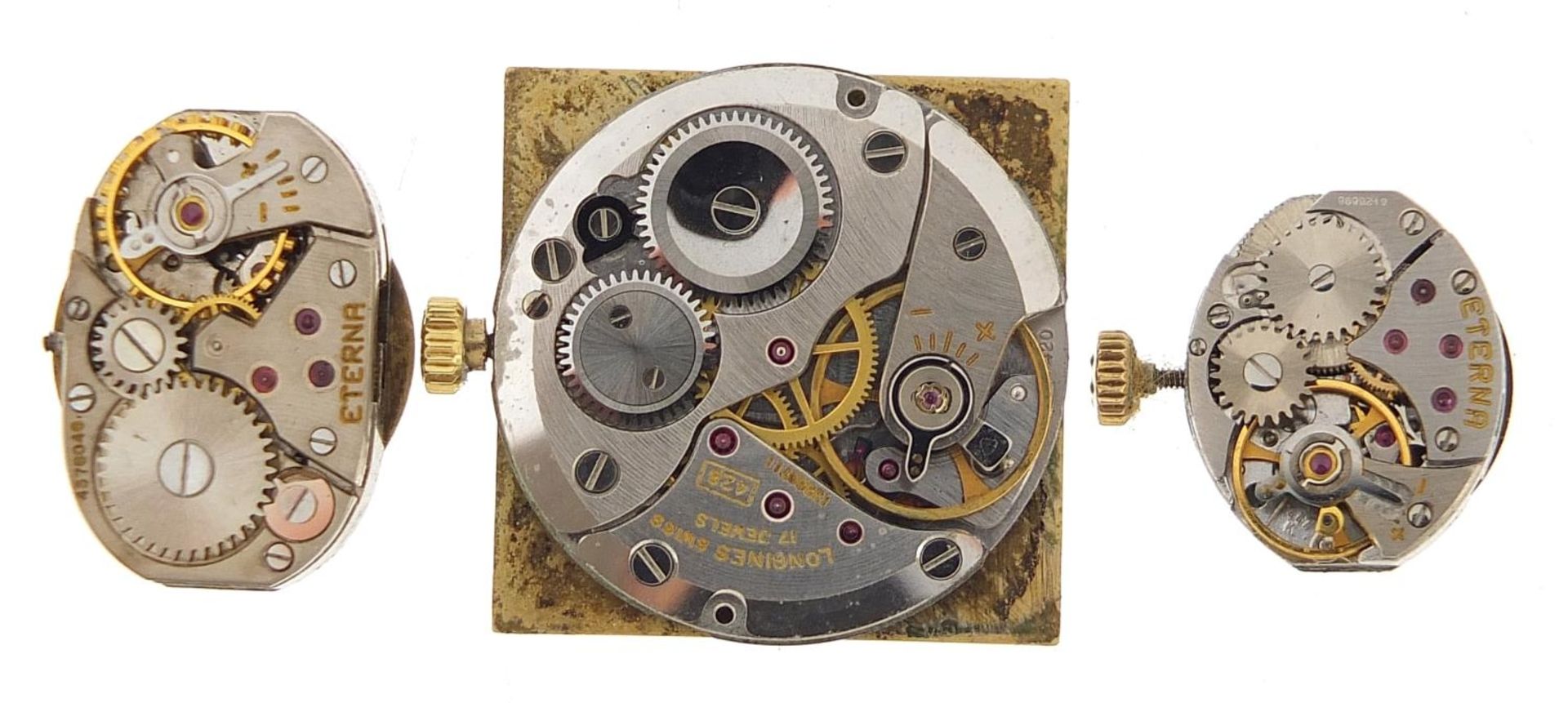 Longines wristwatch movement and two ladies Eterna wristwatch movements, the largest 23mm wide - Image 2 of 2