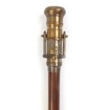 Hardwood walking stick with brass two draw telescope and compass handle, 100cm in length