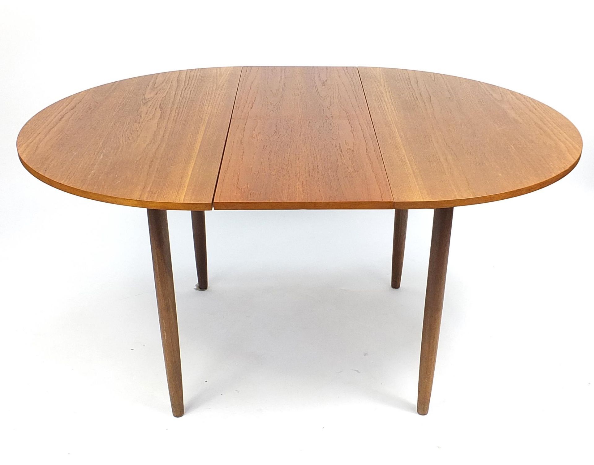1970's G Plan teak circular extending dining table and four chairs, the table 72.5cm high x 112cm in - Bild 5 aus 7