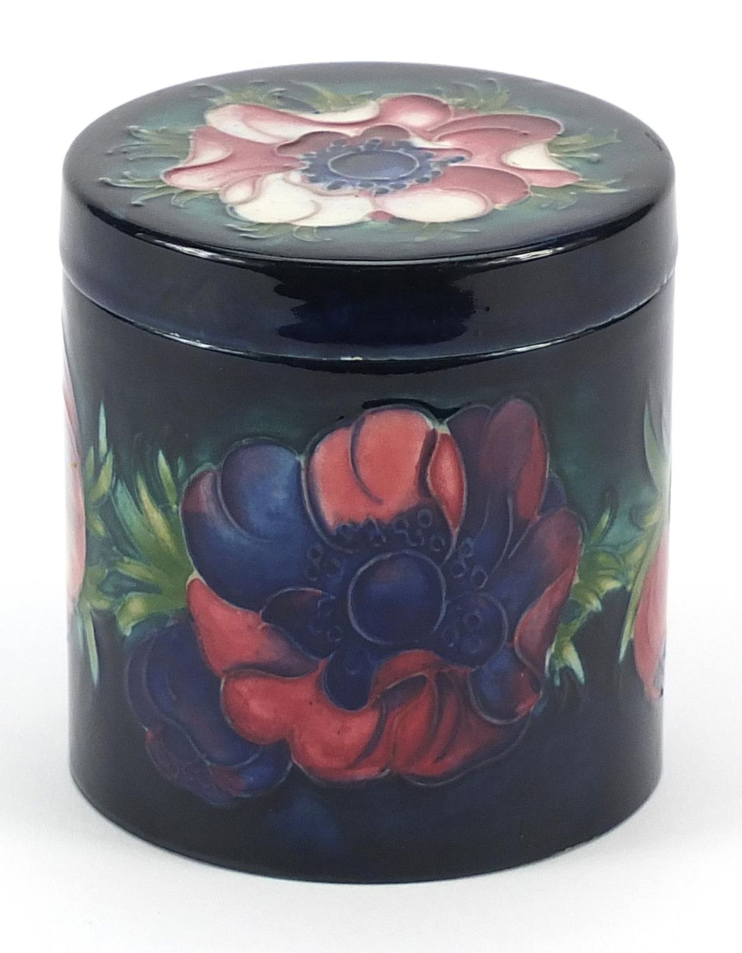 Moorcroft pottery jar and cover hand painted with flowers, 9.5cm high