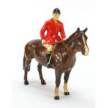 Beswick huntsman on horseback, 22cm in length