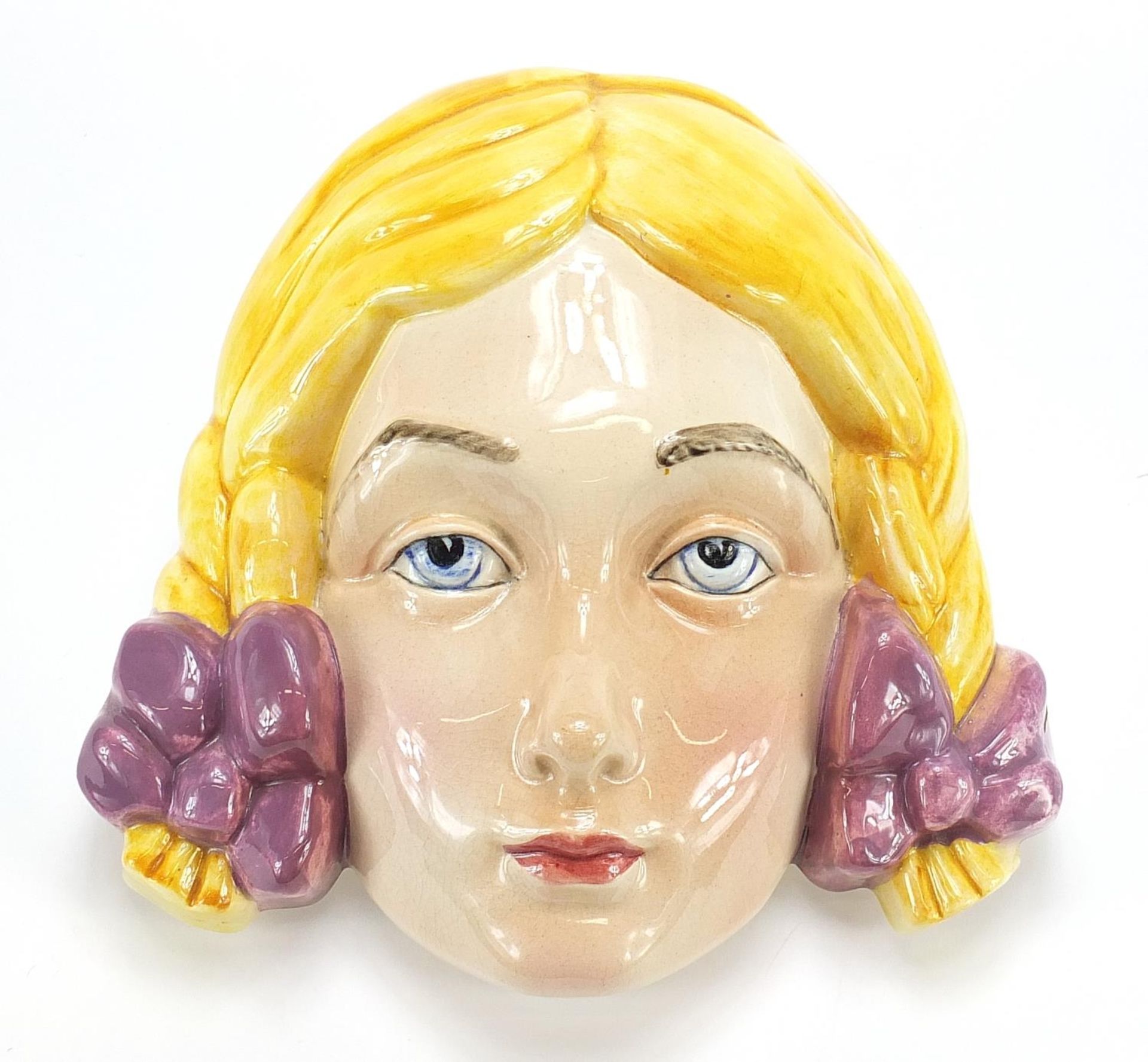 Art Deco Beswick face mask of a young female, 20.5cm high