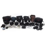 Collection of cameras and accessories including Canon EOS 1000F, Canon EOS 850, Canon EOS 1000F,