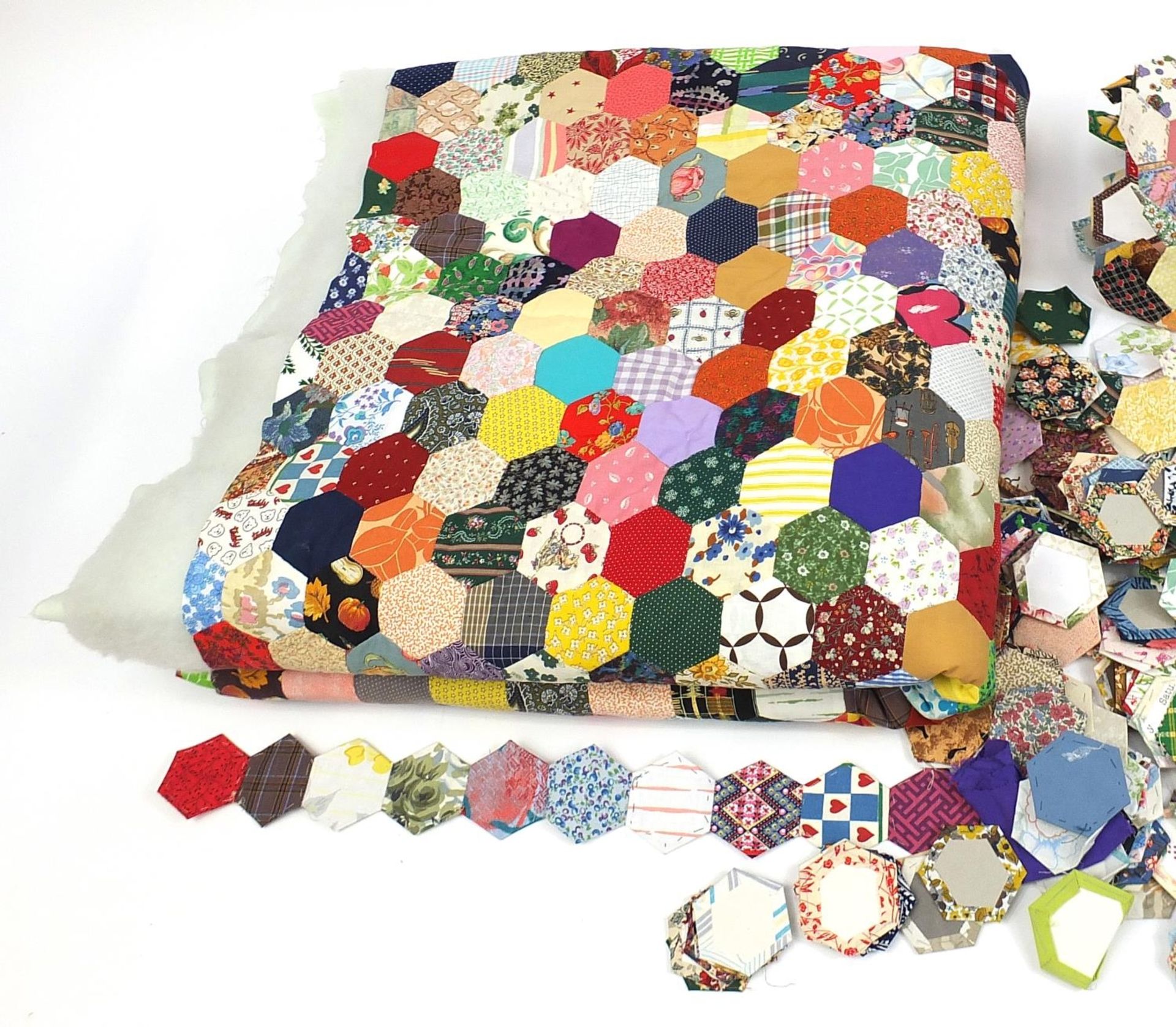 Large hand made patchwork quilt with a large selection of loose patches, the quilt approximately - Image 6 of 7